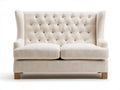 Kremowa sofa dwuosobowa Chesterfield z pikowanym oparciem 150 x 85 x 105 cm